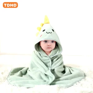 child wrapped in soft towel w/hood